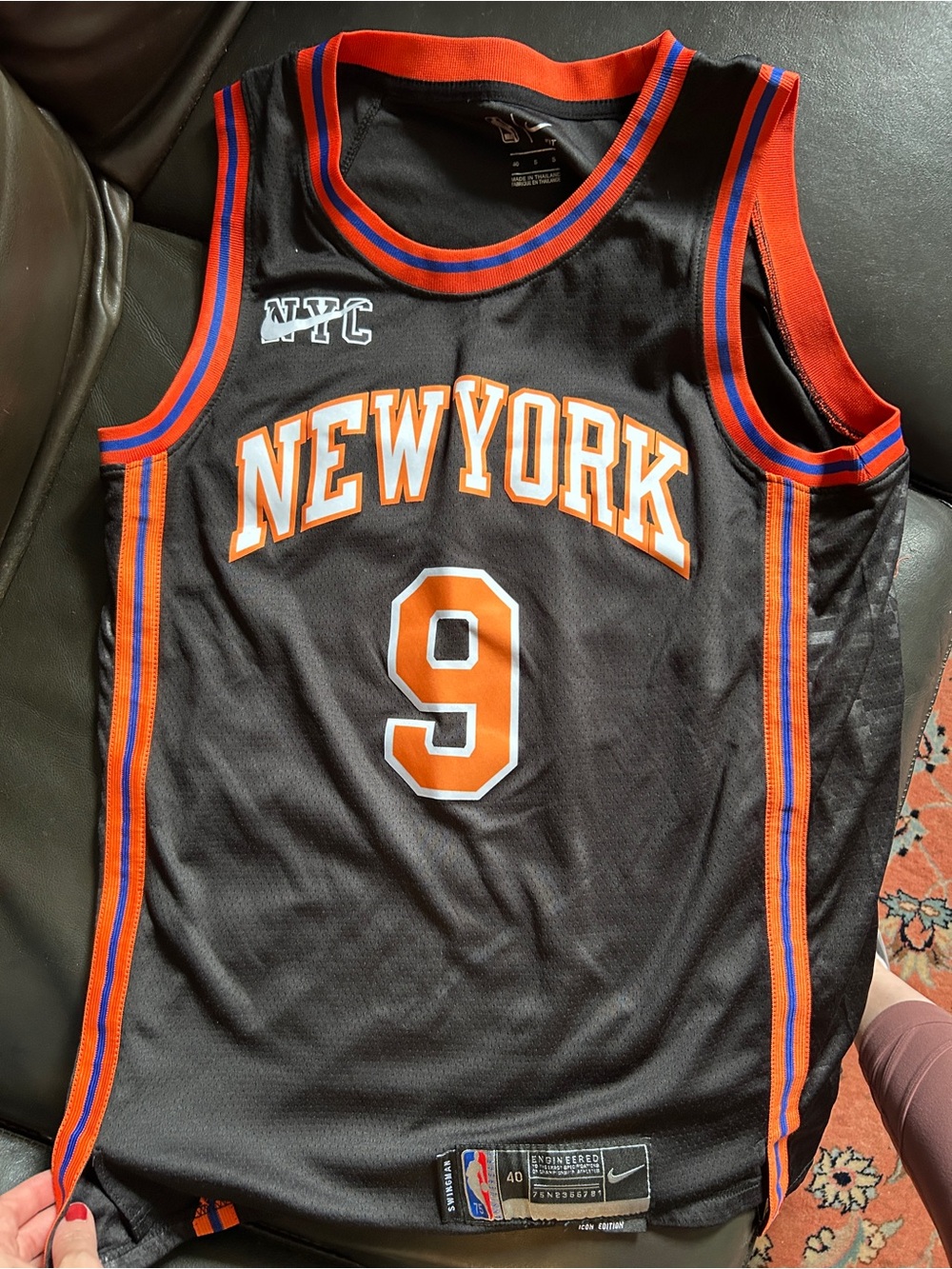 Nike Black Basketball Jersey with Orange and Blue Trim